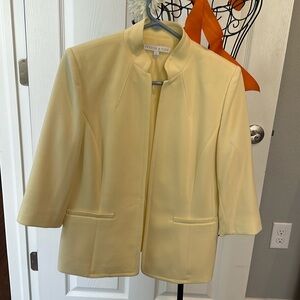 Brand new!  Gorgeous pale yellow pant suit.
